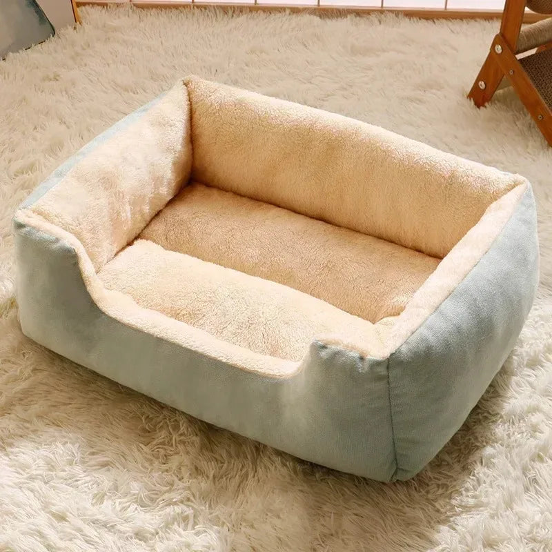 Cozy plush pet bed mat in soft blue and beige, perfect for cats and small pets to relax and enjoy comfort.
