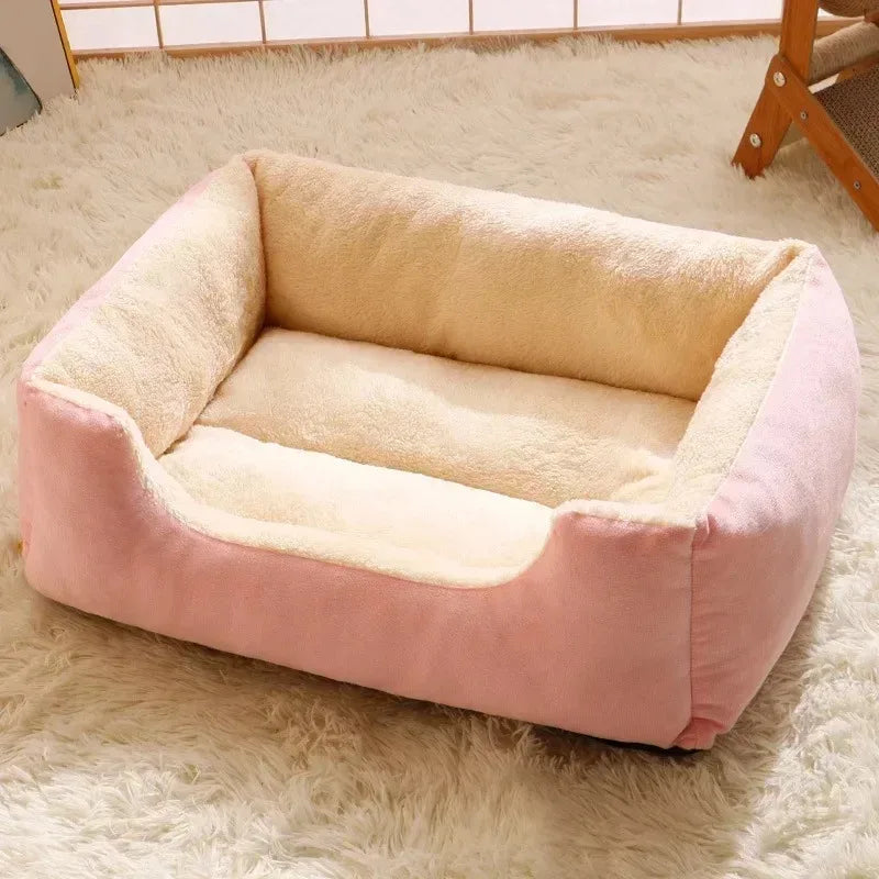 Cozy pink pet bed mat with soft plush interior, perfect for cats and small pets. Luxury design for comfort and relaxation.
