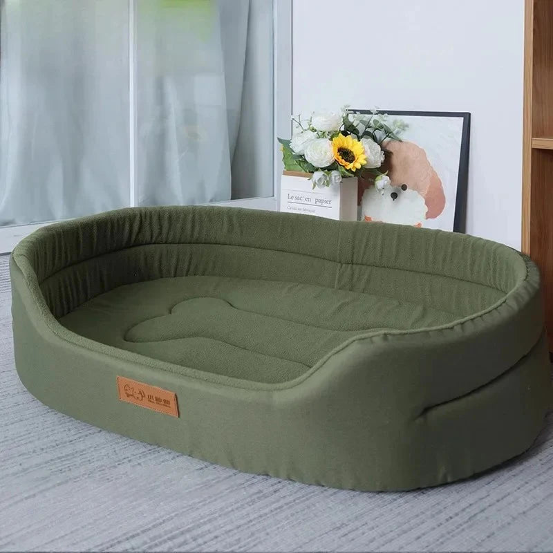 Cozy green dog bed with soft padding, perfect for pet relaxation and stylish home decor.